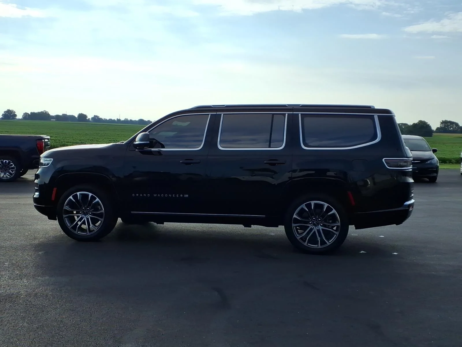 Used 2023 Diamond Black Crystal Pearl Coat Jeep Series III image 17