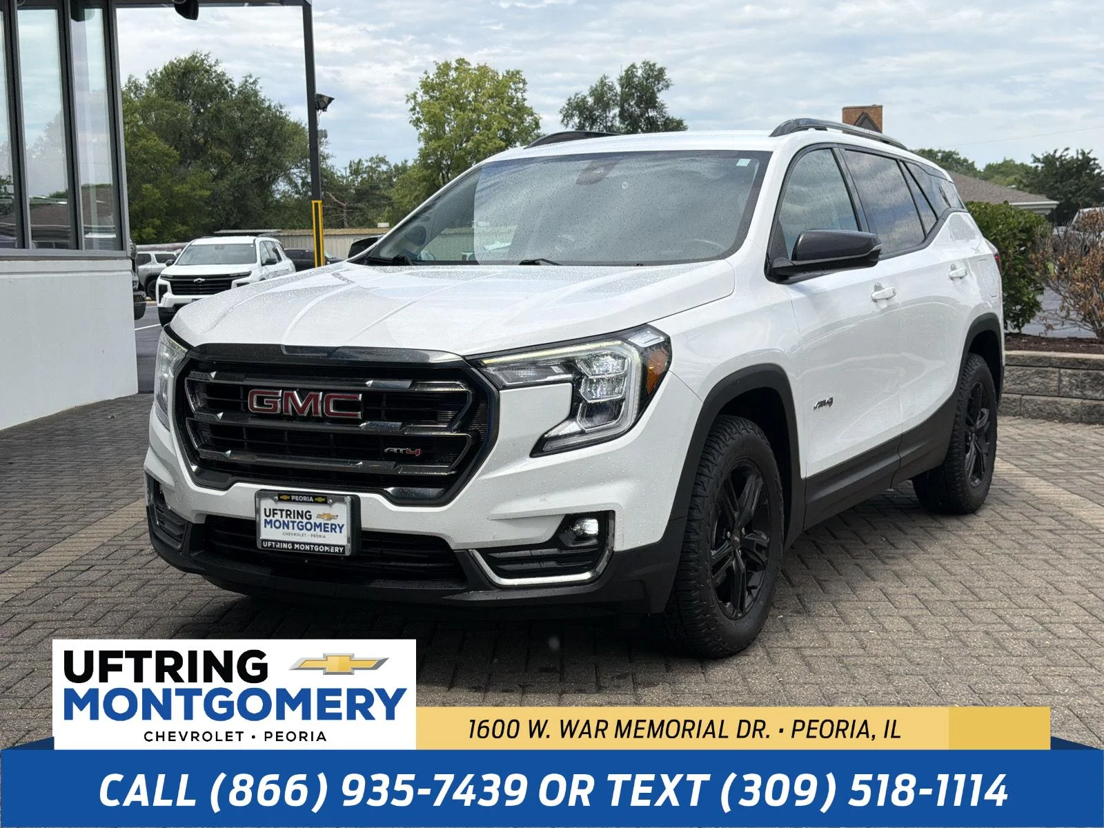 Used 2023 Summit White GMC AT4 image 1