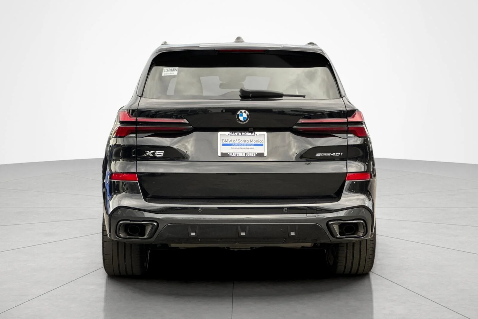 Used 2025 Black Sapphire Metallic BMW sDrive40i image 4