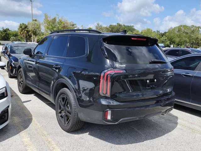 Used 2025 Black Kia EX X-Line image 8