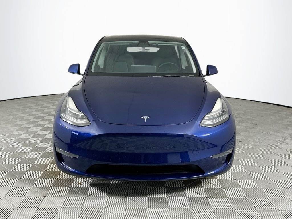 Used 2022 Tesla Model Y Long Range with VIN 7SAYGDEE2NA002822 for sale in Naples, FL