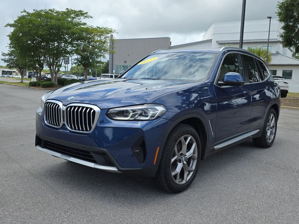 Used 2023 Blue BMW sDrive30i image 1
