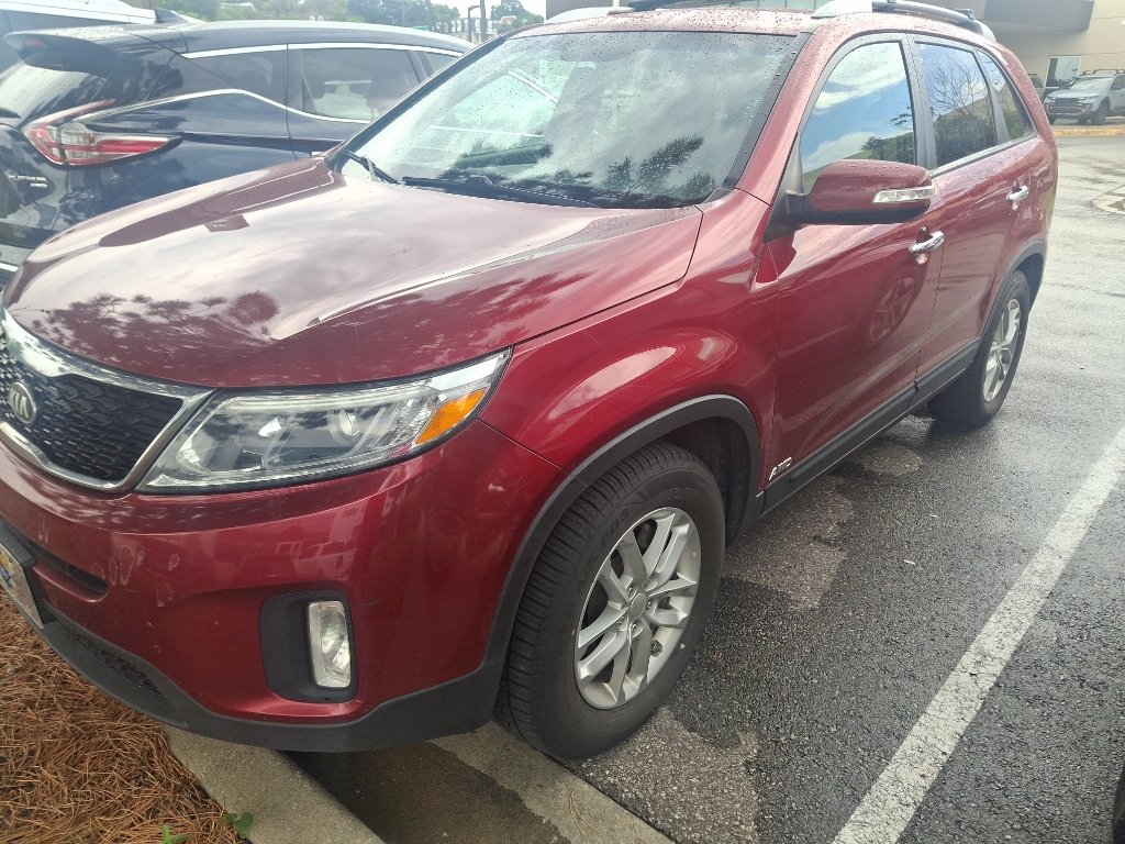 Used 2014 Remington Red Metallic Kia LX image 1