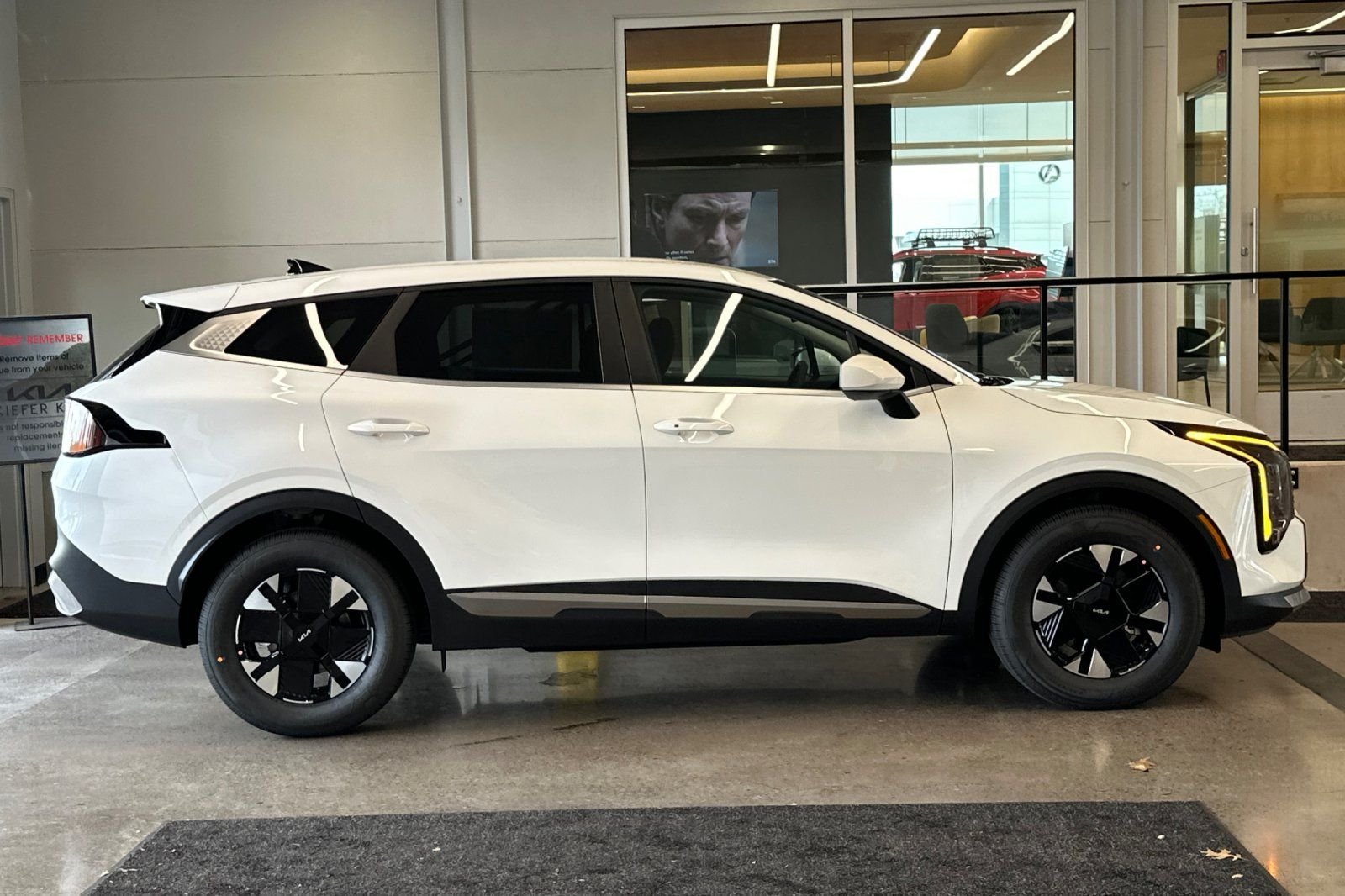 New 2026 Snow White Pearl Kia LX image 2