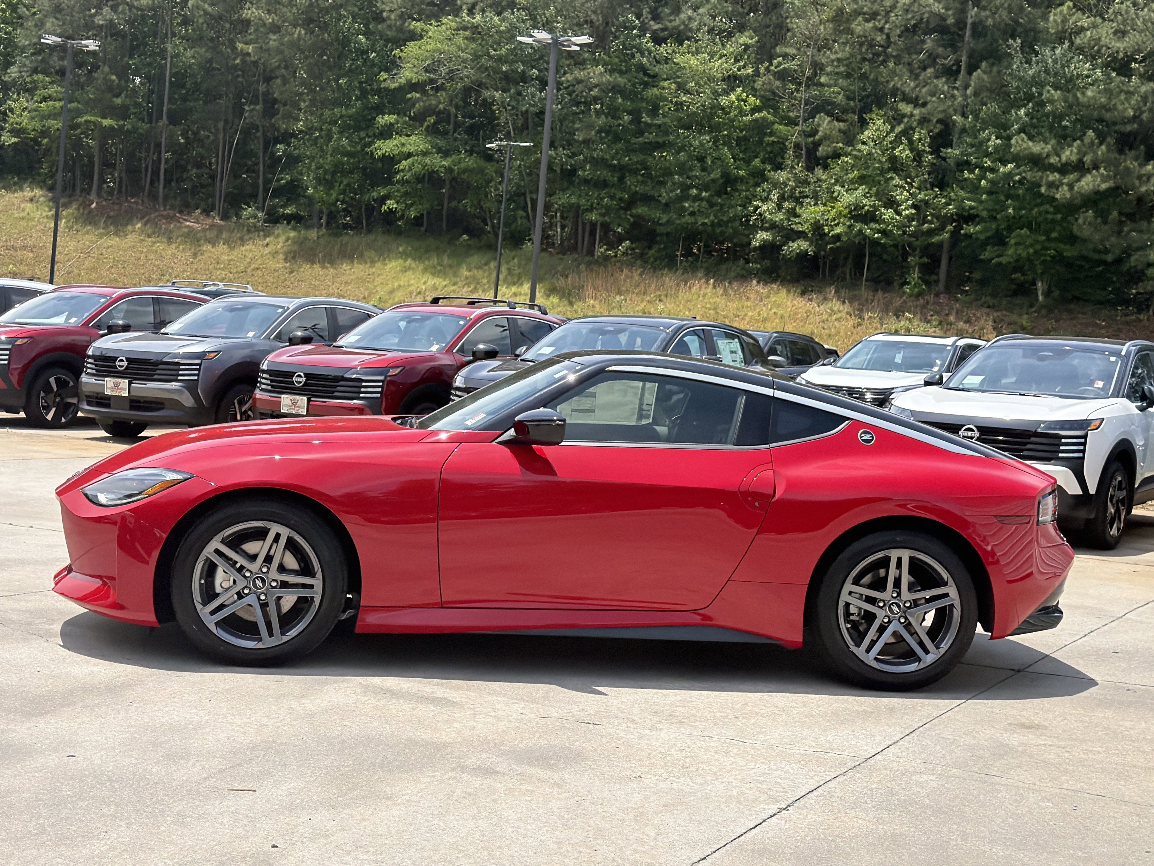 New 2026 Solid Red/Super Black Nissan Sport image 5