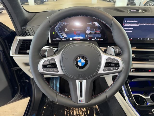 New 2027 Tanzanite Blue II Metallic BMW M60i image 16