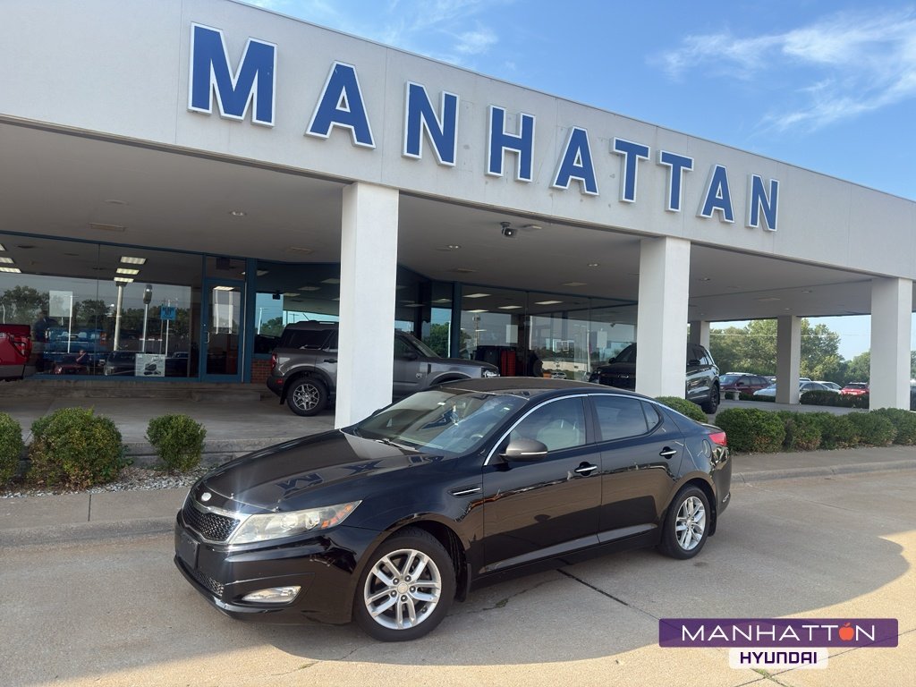Used 2013 Ebony Black Kia LX image 1