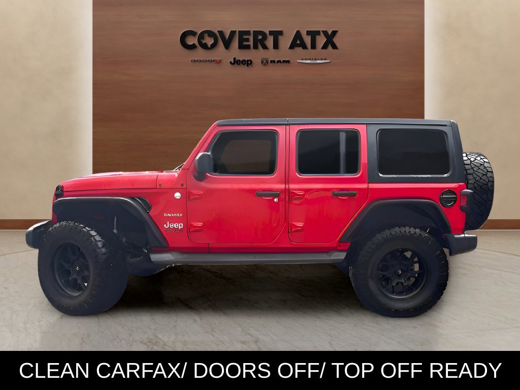 Used 2019 Red Jeep Unlimited Sahara image 2