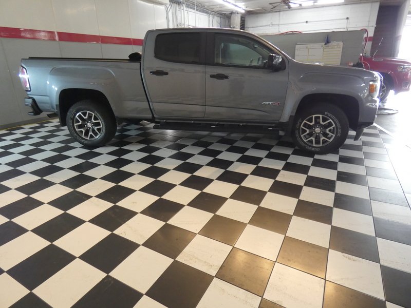 Used 2022 GRAY GMC 4WD Crew Cab 128" AT4 w/Cloth image 3