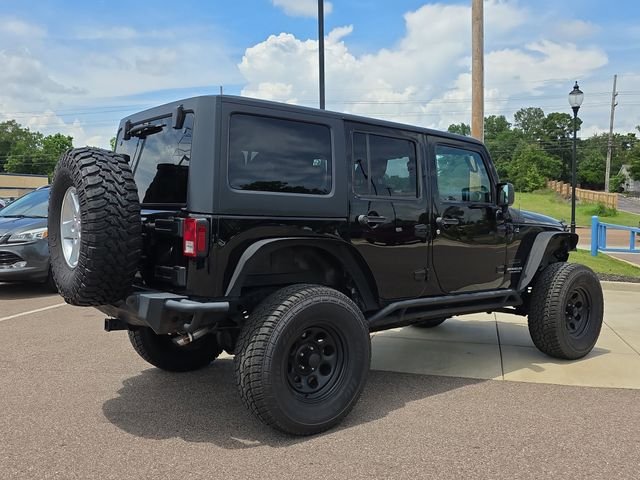 Used 2016 Black Clearcoat Jeep Unlimited Sport image 3