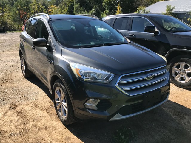 Used 2018 Magnetic Metallic Ford SEL image 1