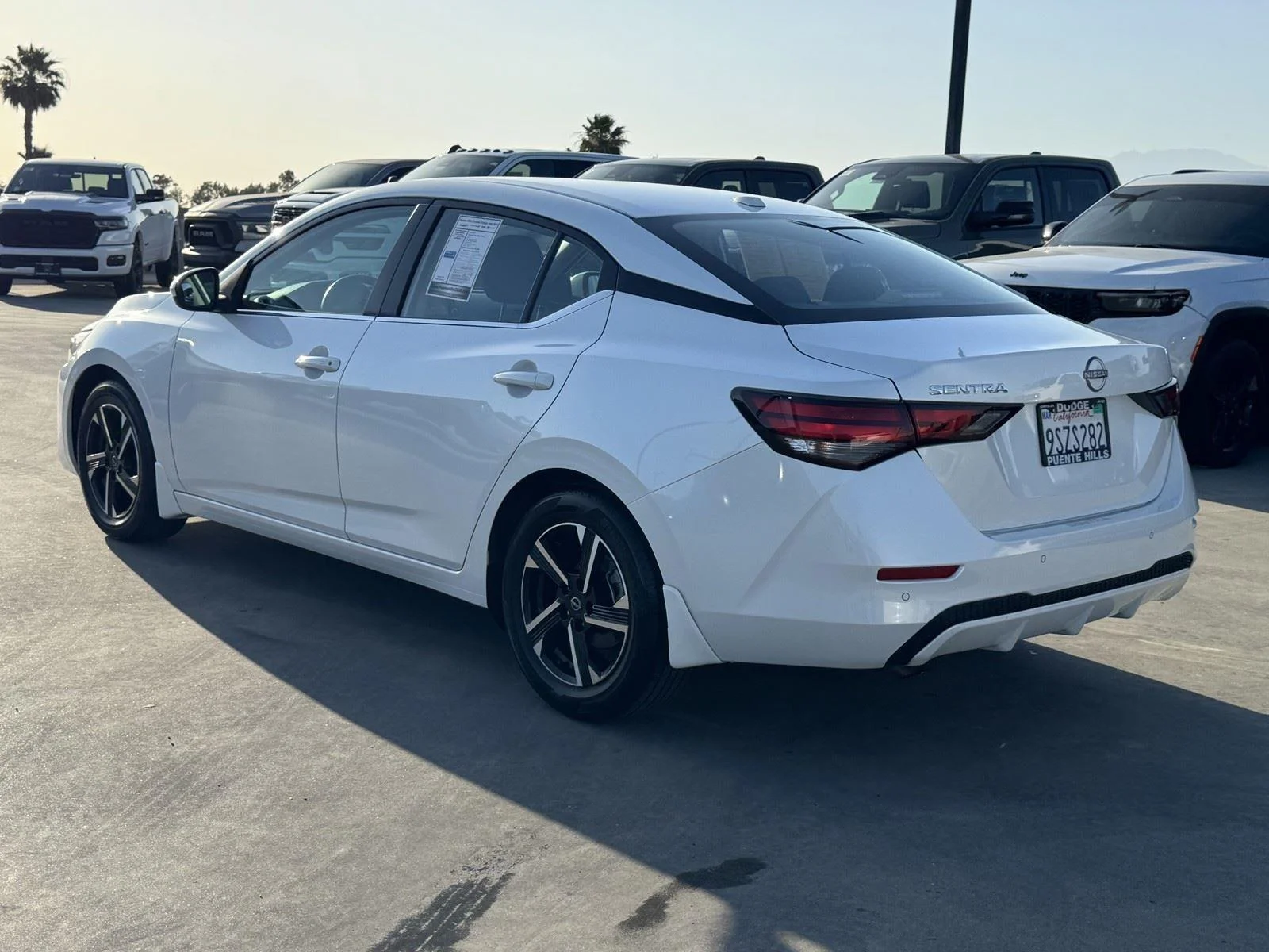 Used 2025 Aspen White Tricoat Nissan SV image 2