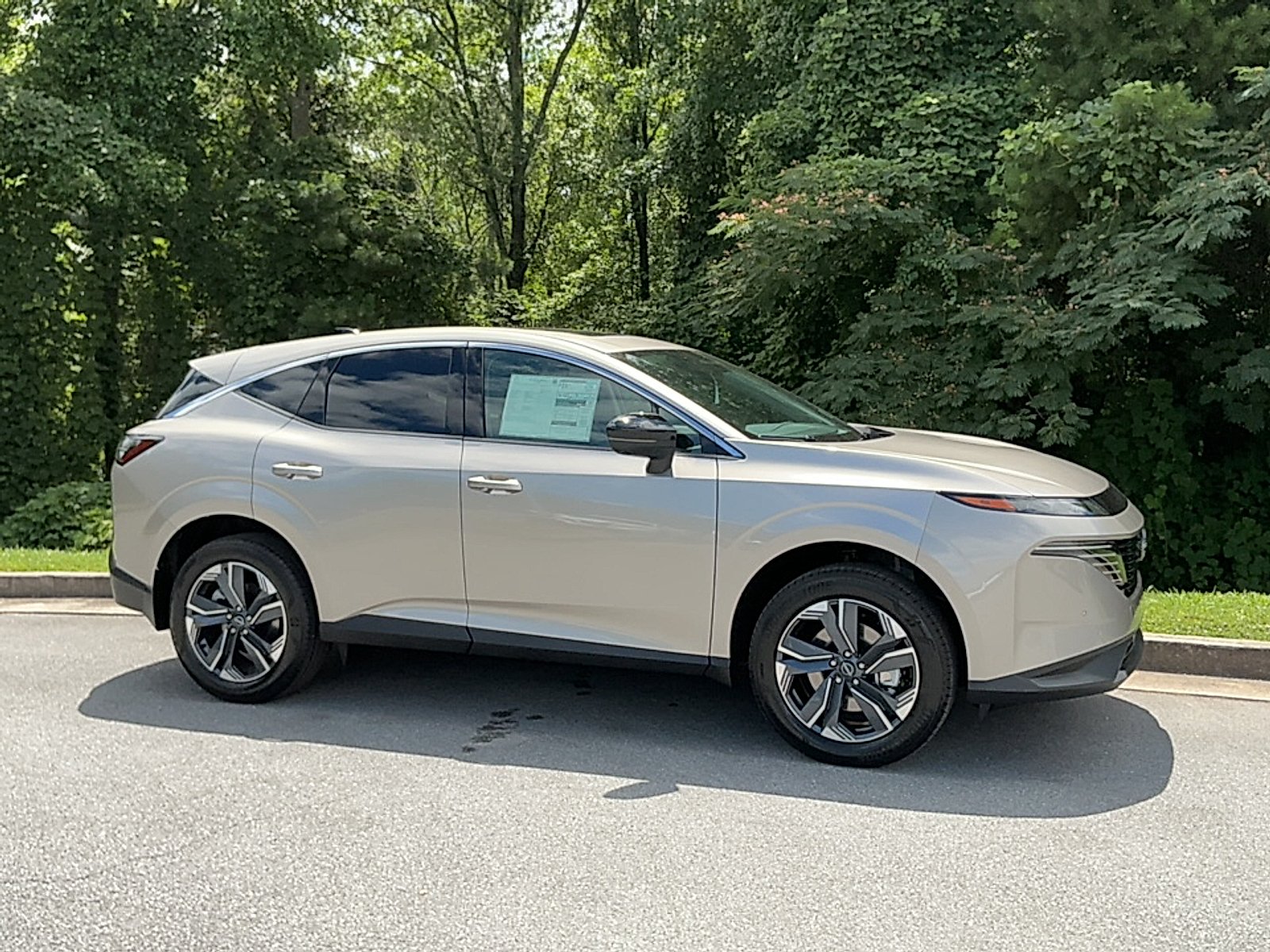 New 2026 Champagne Silver Metallic Nissan SL image 1