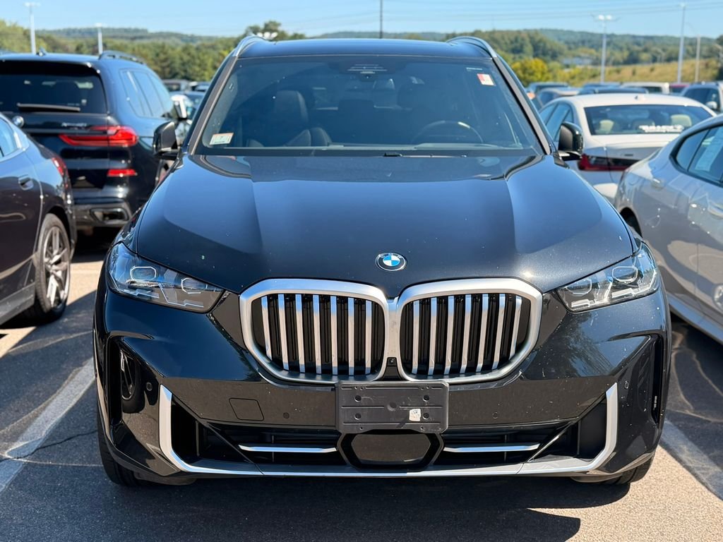 Certified Used 2024 Black Sapphire Metallic BMW xDrive40i image 2