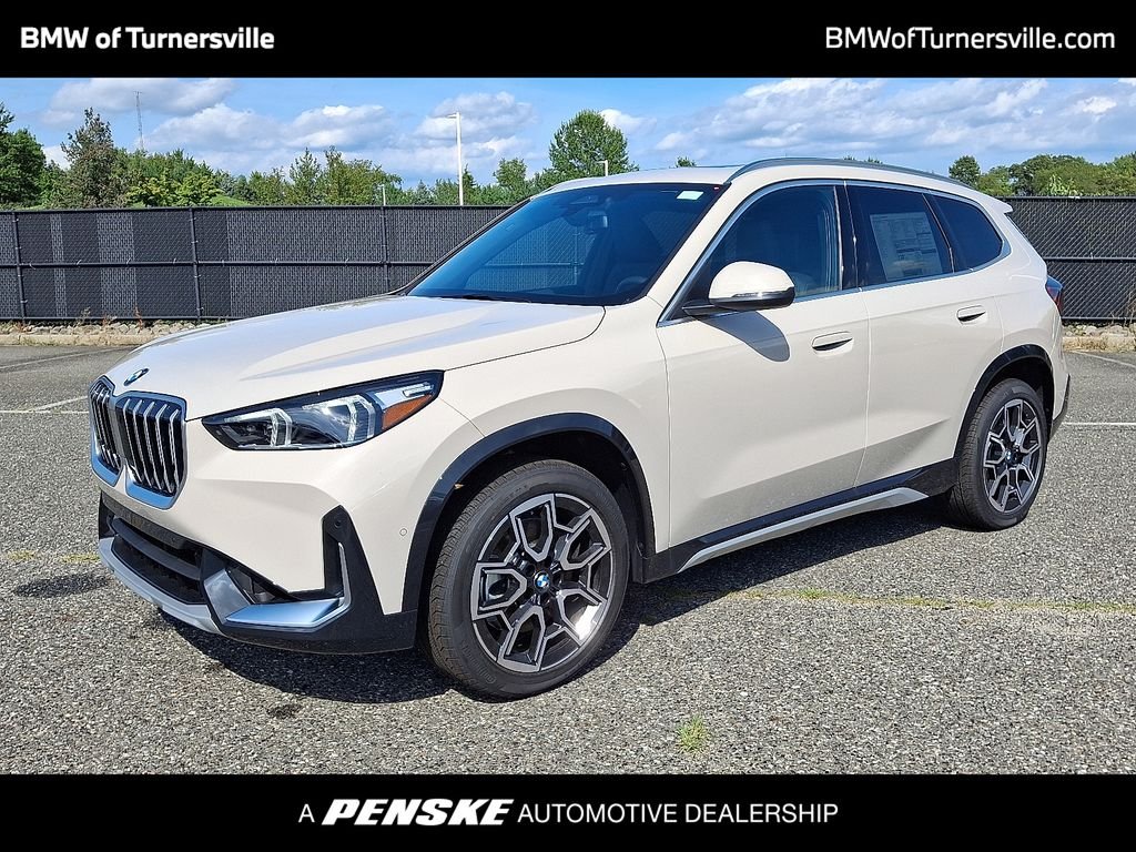 New 2027 Dune Grey Metallic BMW xDrive28i image 1