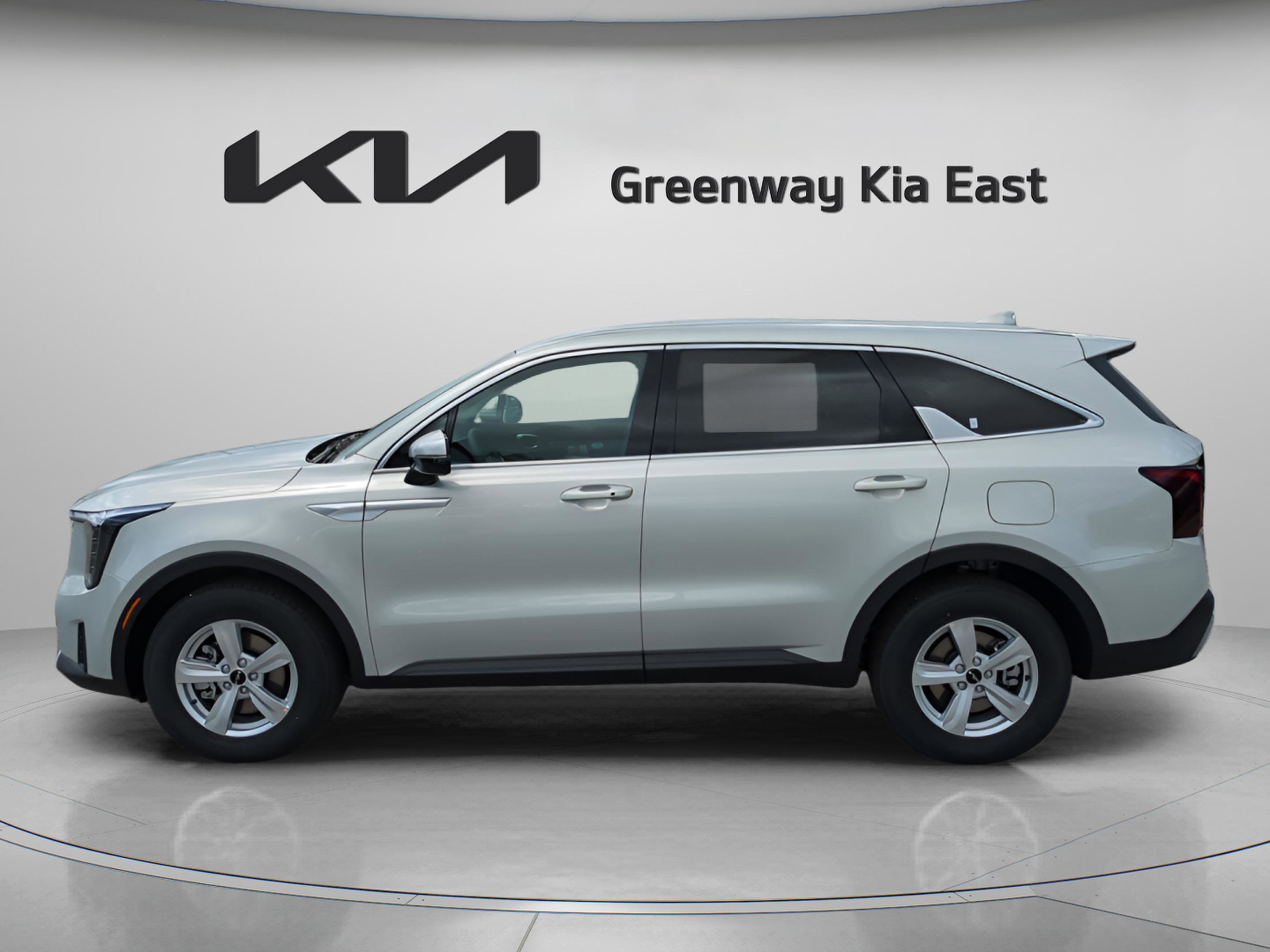New 2026 Ivory Silver Kia LX image 9