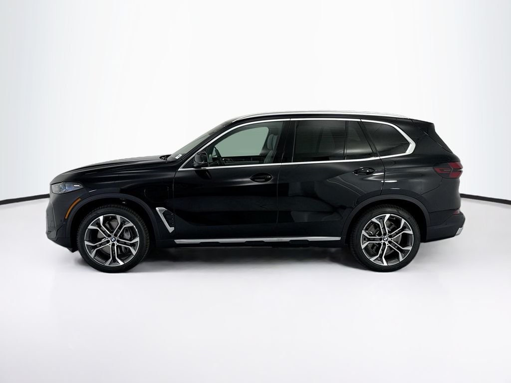 New 2026 Black Sapphire Metallic BMW xDrive50e image 8
