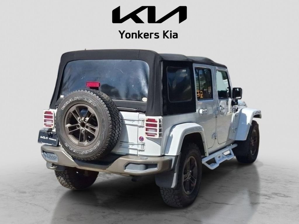 Used 2016 White Jeep Unlimited Sahara image 5