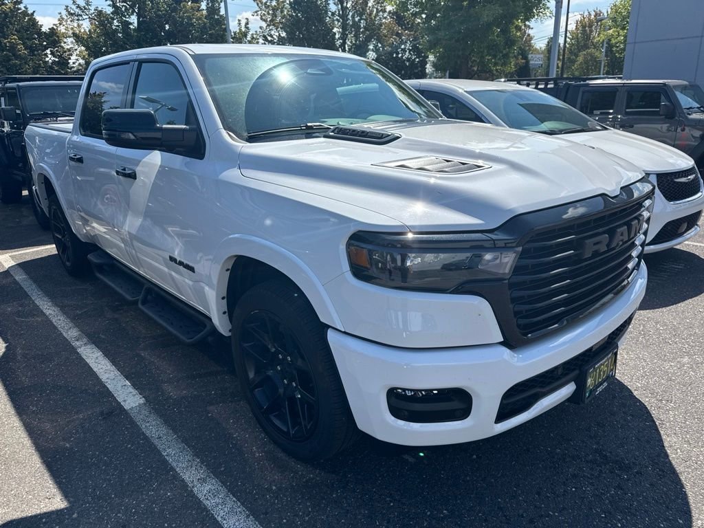 Used 2025 Bright White Clearcoat Ram Laramie image 1