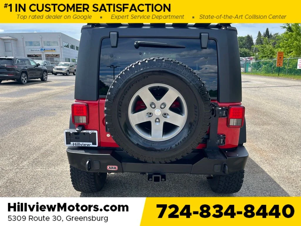 Used 2010 Flame Red Jeep Unlimited Rubicon image 4
