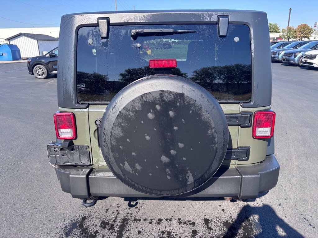 Used 2015 Tank Clearcoat Jeep Sport image 6
