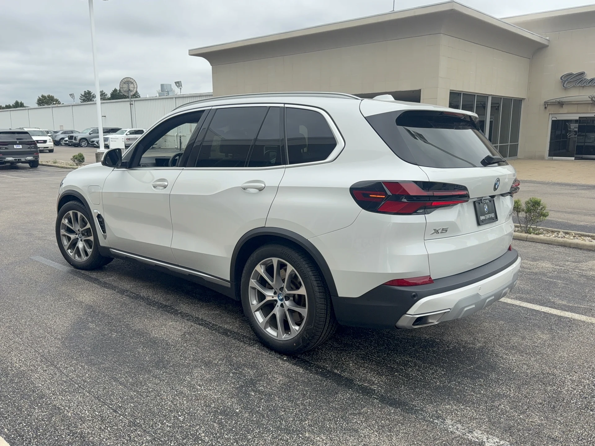 Certified Used 2024 Mineral White Metallic BMW xDrive50e image 7