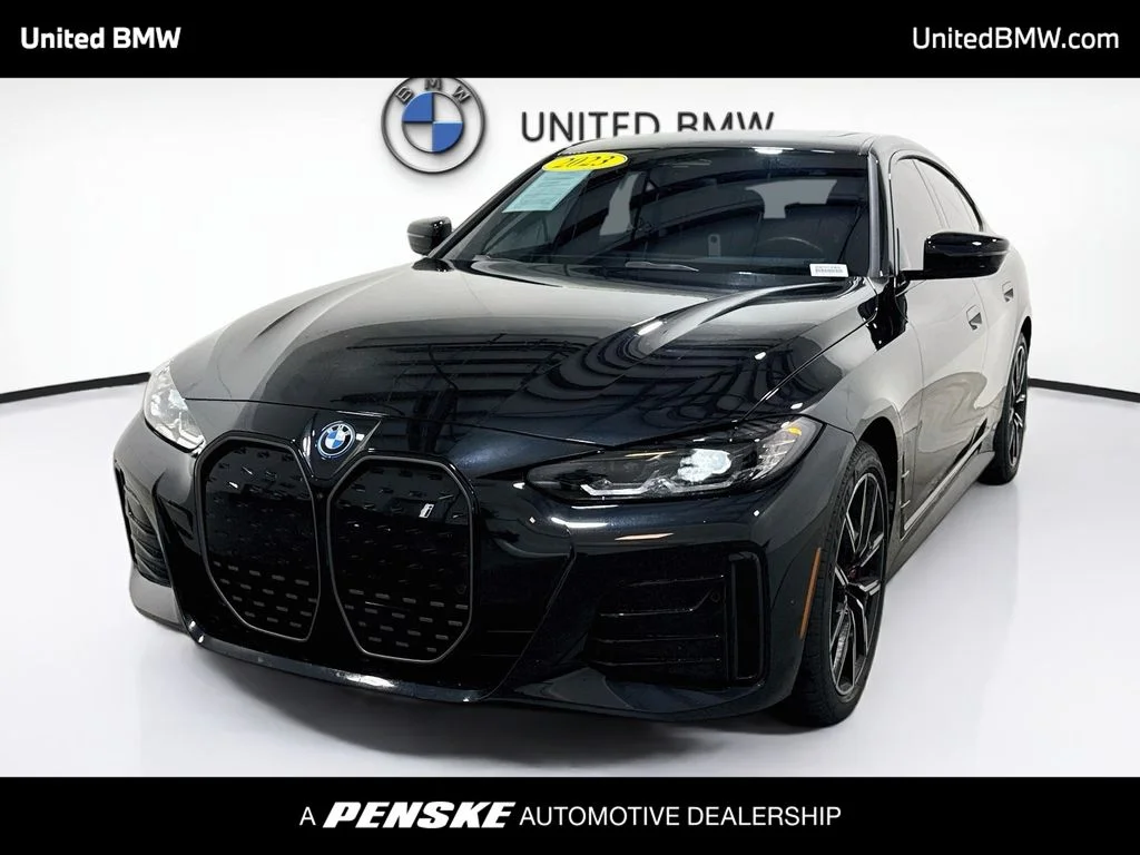 Certified Used 2023 Black Sapphire Metallic BMW eDrive40 image 1