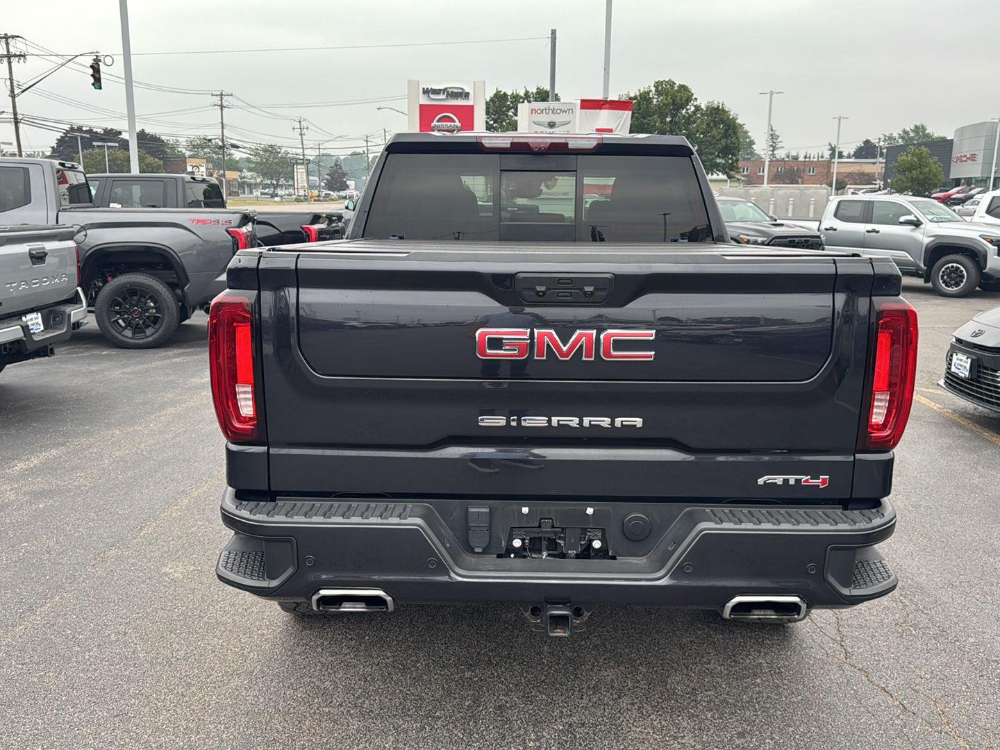 Used 2023 Titanium Rush Metallic GMC AT4 image 5
