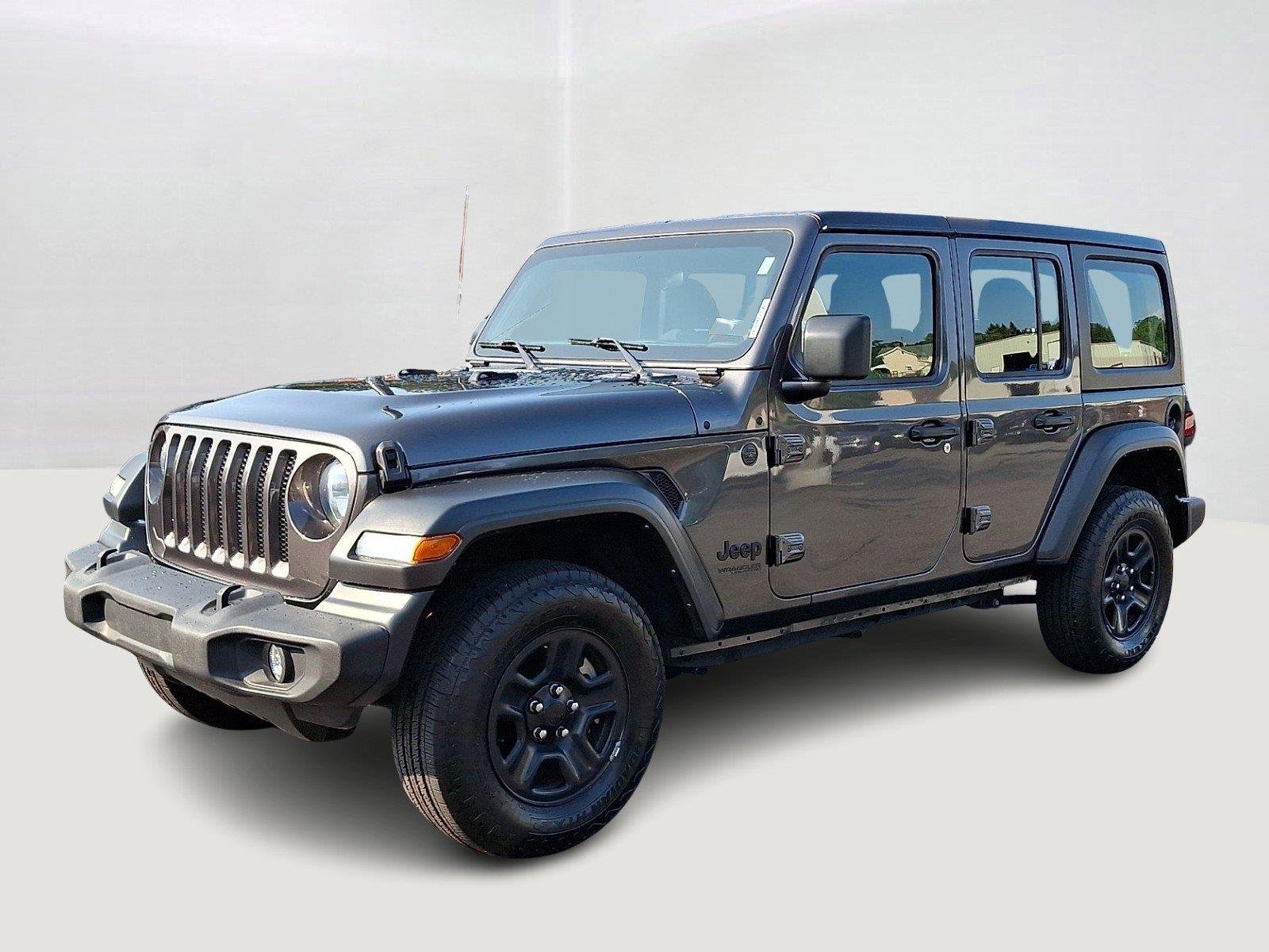 Used 2022 Granite Crystal Metallic Clearcoat Jeep Unlimited Sport image 3