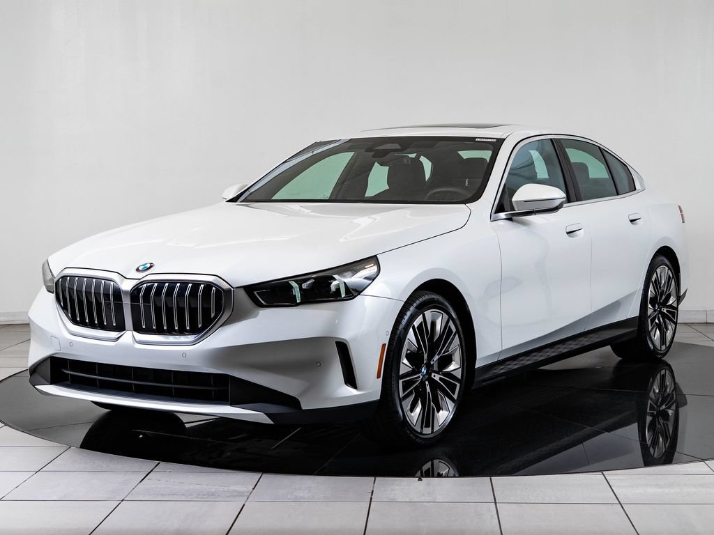 Used 2025 Mineral White Metallic BMW 530i xDrive image 1