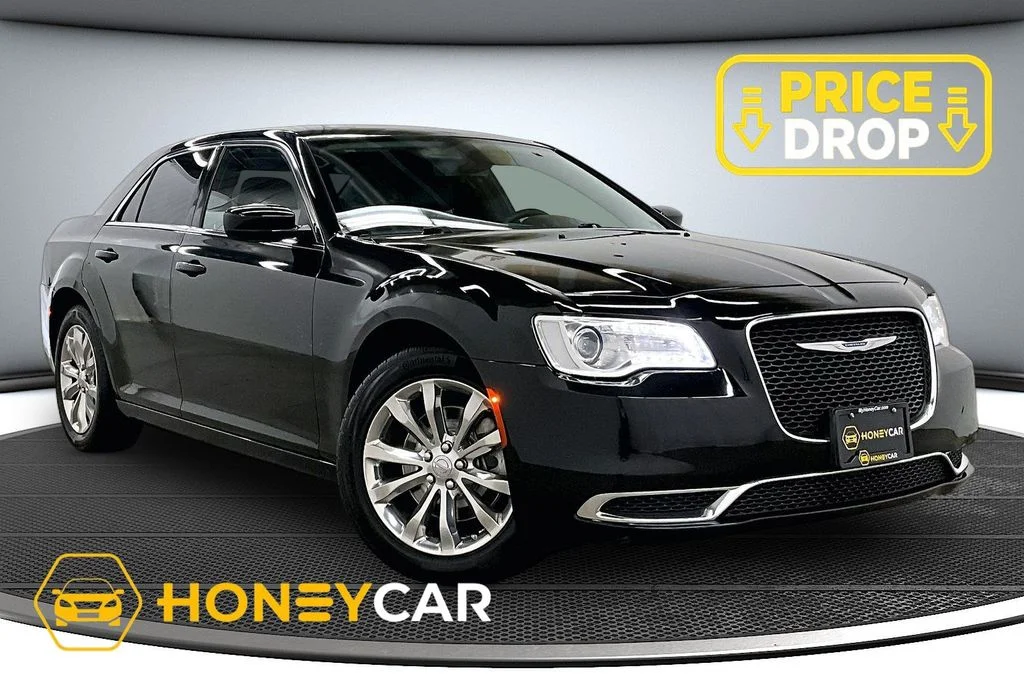 Used 2023 Black Chrysler Touring image 1