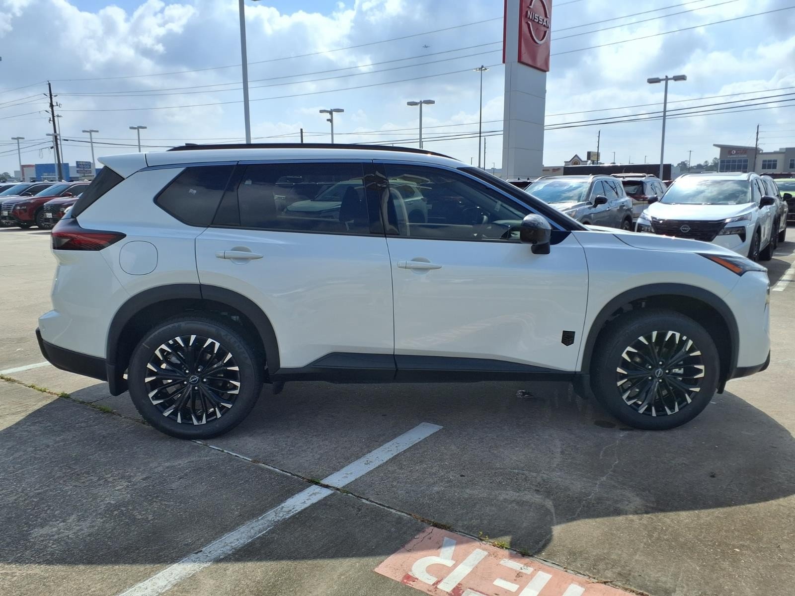 2026 Nissan Rogue Dark Armor™ White at Robbins Nissan