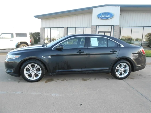 Used 2014 Ford Taurus SEL with VIN 1FAHP2E89EG119615 for sale in Tyndall, SD