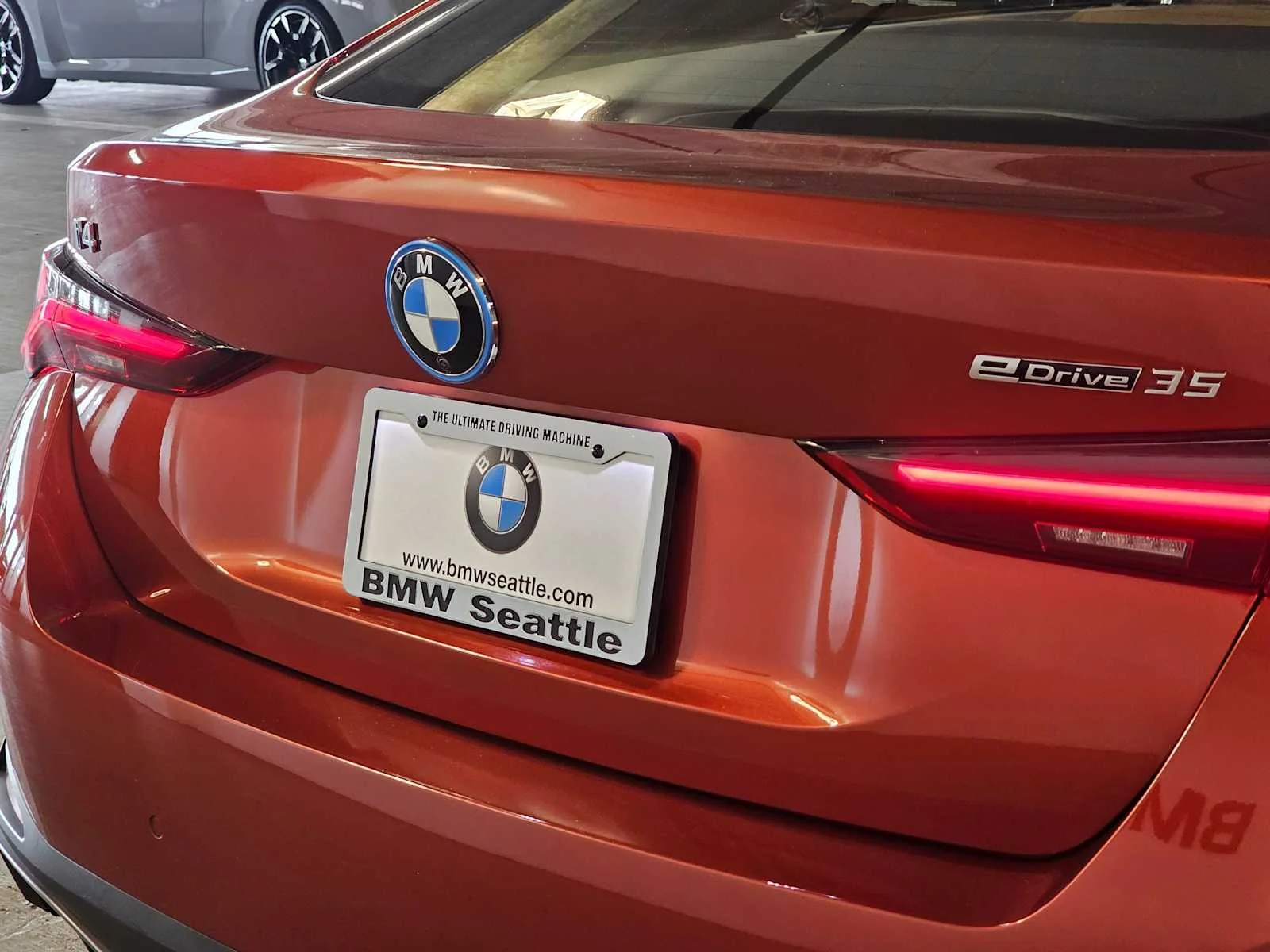 Certified Used 2023 Sunset Orange Metallic BMW eDrive35 image 7