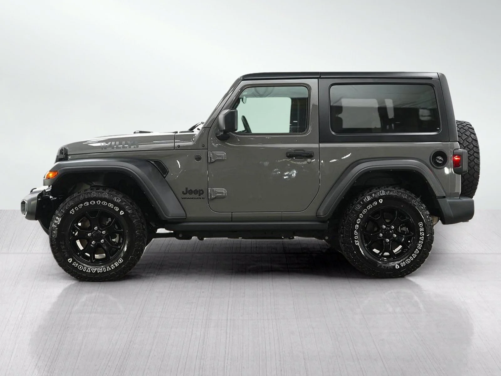 Used 2023 Jeep Wrangler 2-Door Willys with VIN 1C4GJXAN2PW543906 for sale in Hopkins, Minnesota