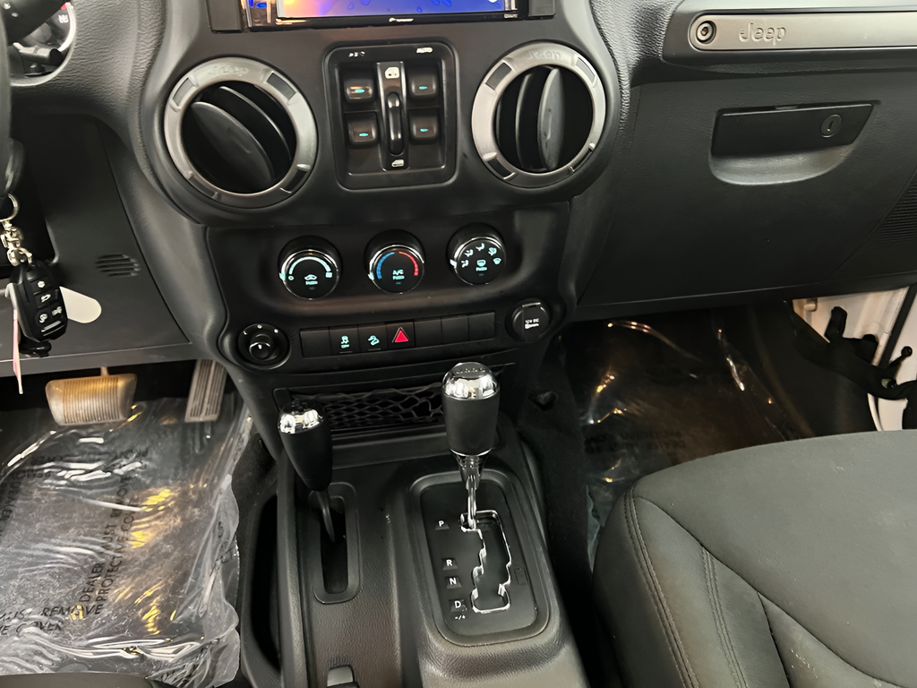 Used 2016 Bright White Clearcoat Jeep Unlimited Sport image 14
