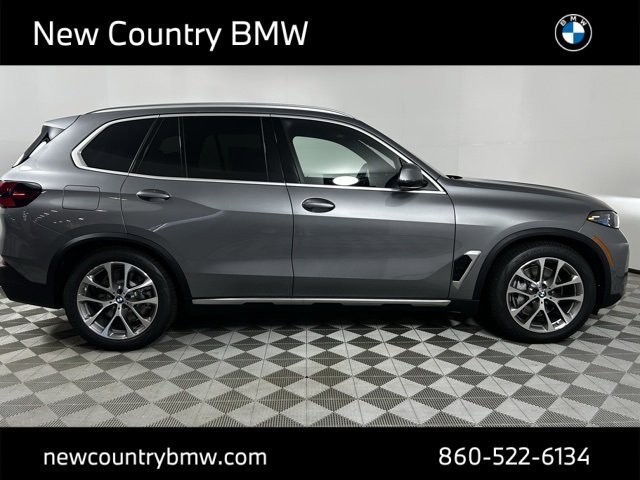 Used 2026 Skyscraper Grey Metallic BMW xDrive50e image 8