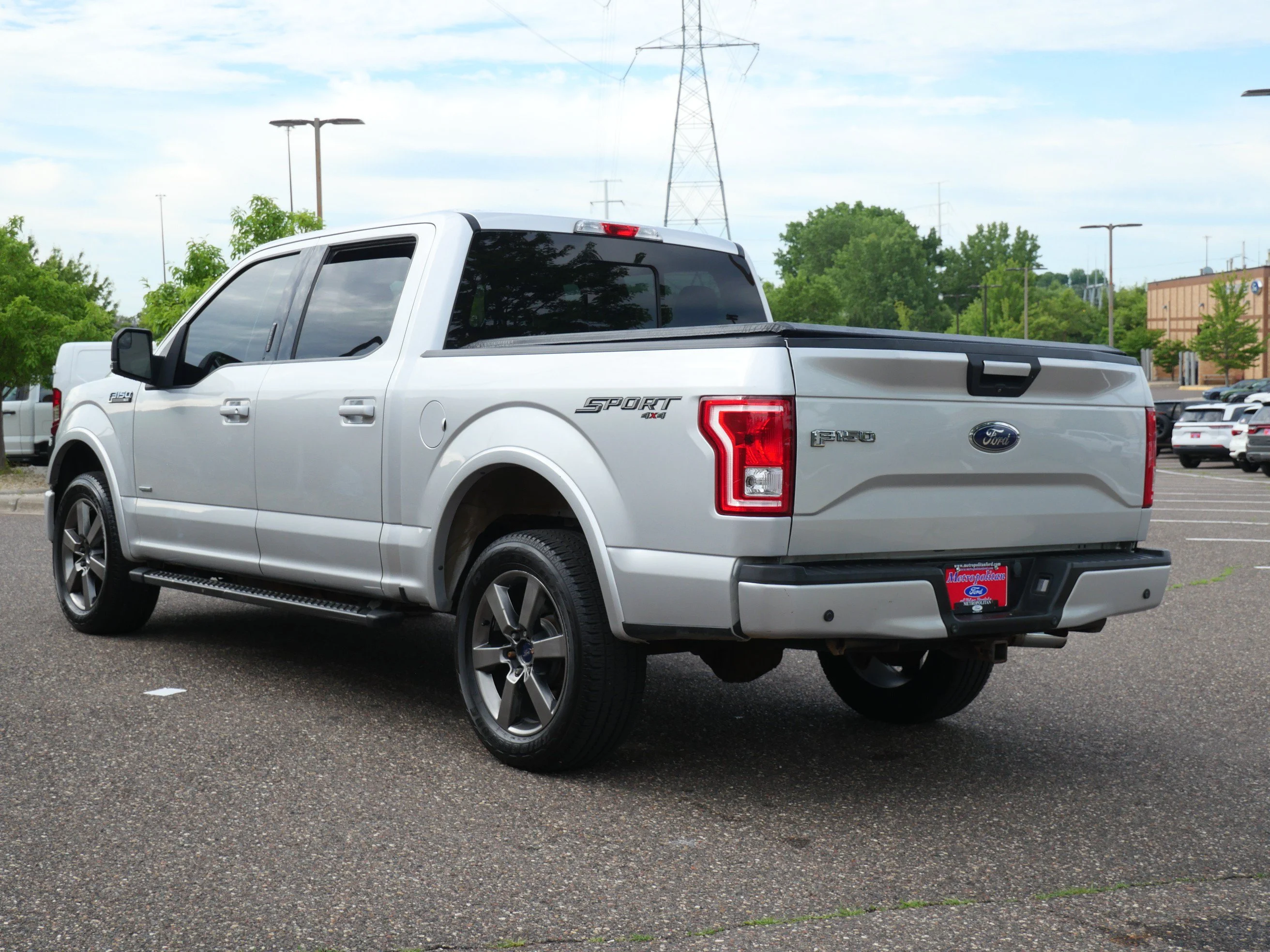 Used 2016 Ingot Silver Metallic Ford XLT 4WD SuperCrew 145 image 4