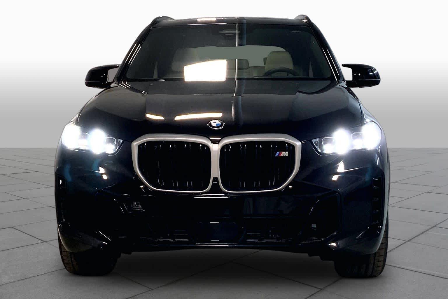 New 2026 Black Sapphire Metallic BMW M60i image 3