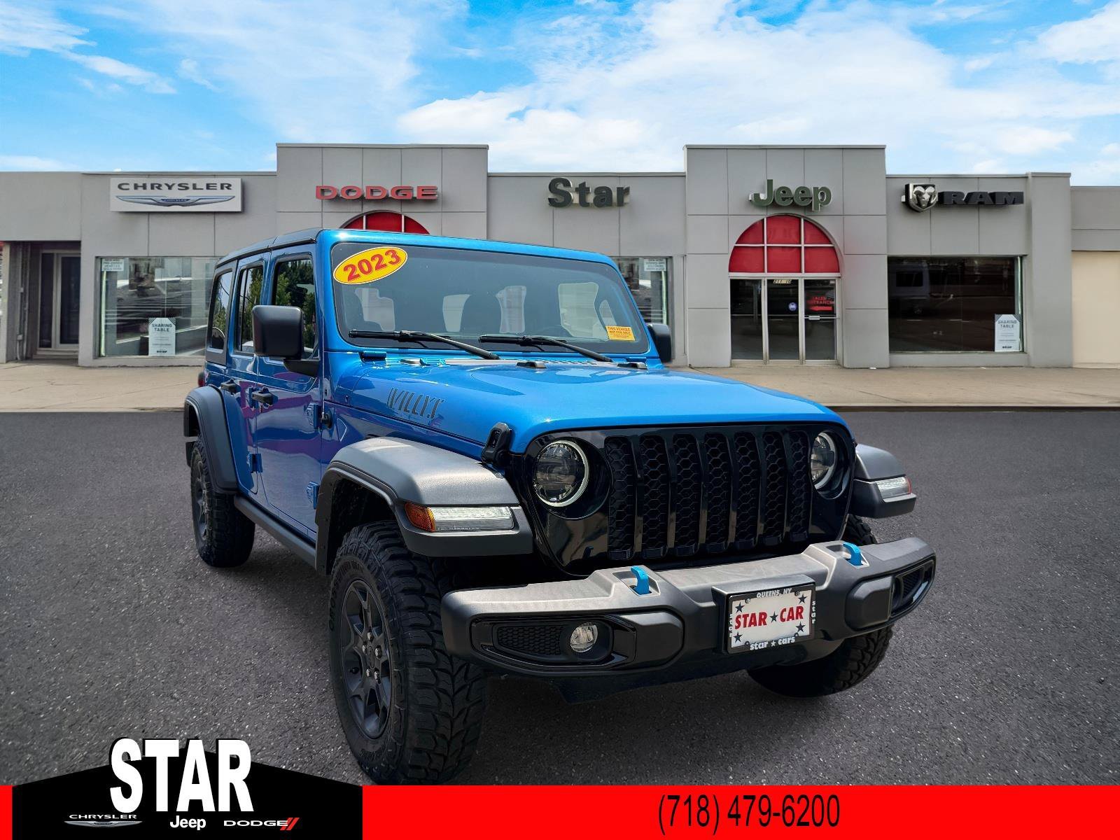 Used 2023 Hydro Blue Pearlcoat Jeep Willys image 1
