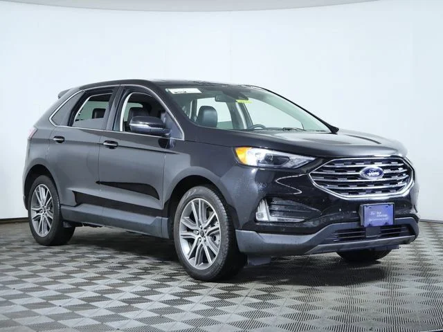 Used 2024 Black Ford Titanium image 1