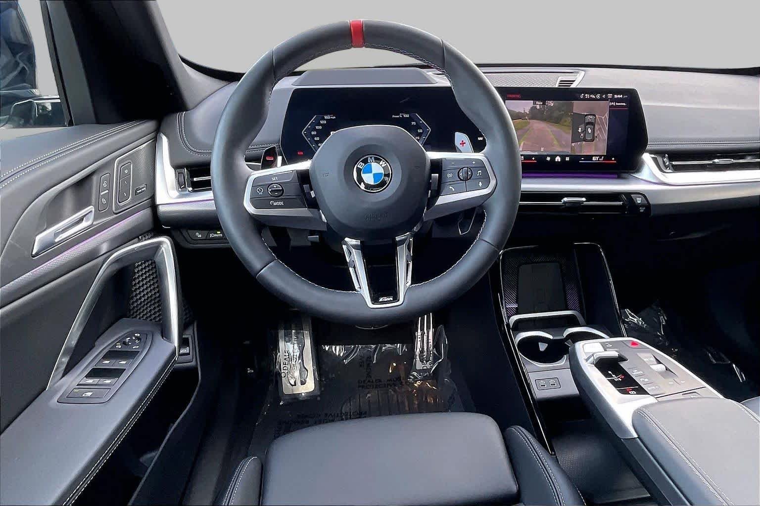 Used 2026 Cape York Green Metallic BMW M35i image 5
