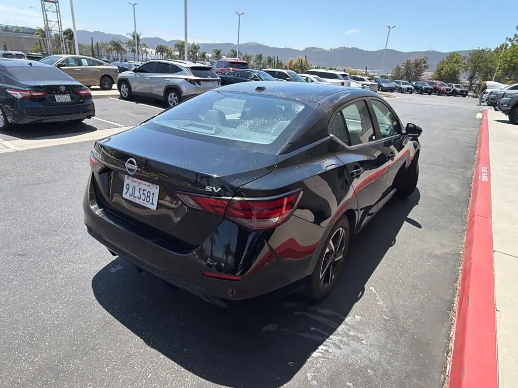 Used 2024 Black Nissan SV image 6