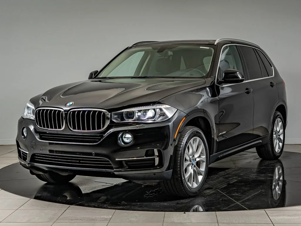 Used 2015 Black Sapphire Metallic BMW xDrive35i image 1