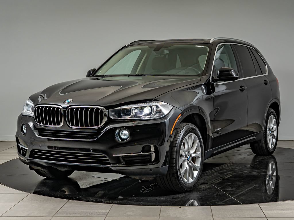 Used 2015 Black Sapphire Metallic BMW xDrive35i image 1