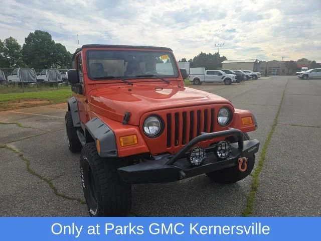 Used 2005 Impact Orange Cle Jeep Sport image 7
