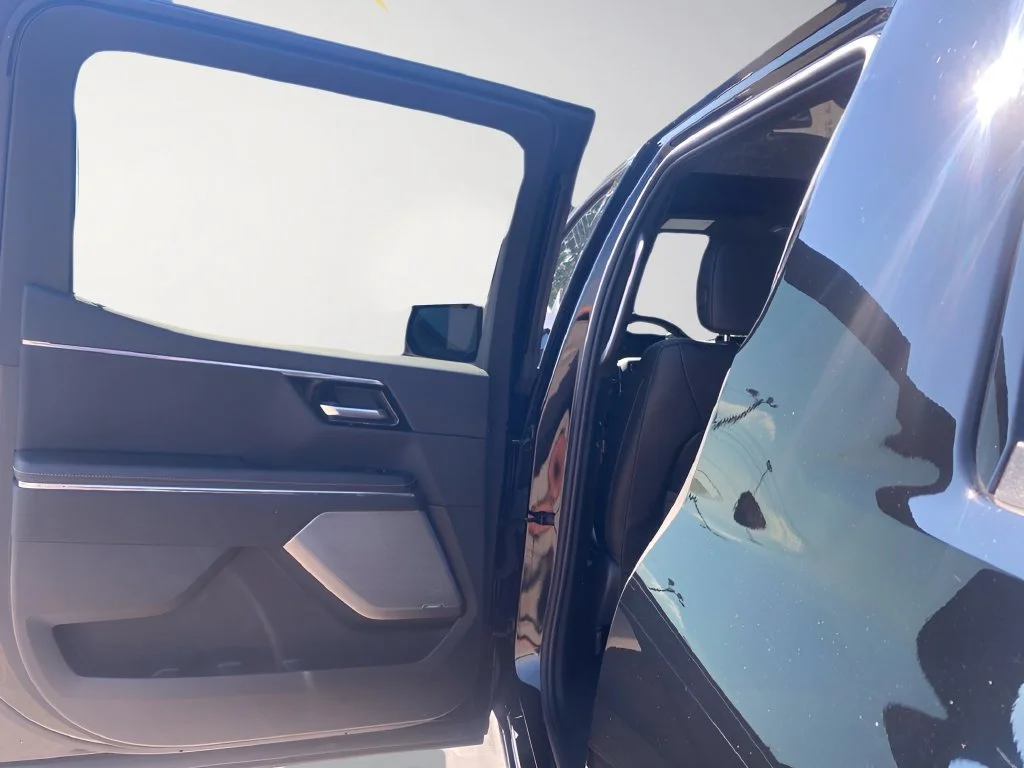 Used 2025 Onyx Black GMC Max Range Denali image 25