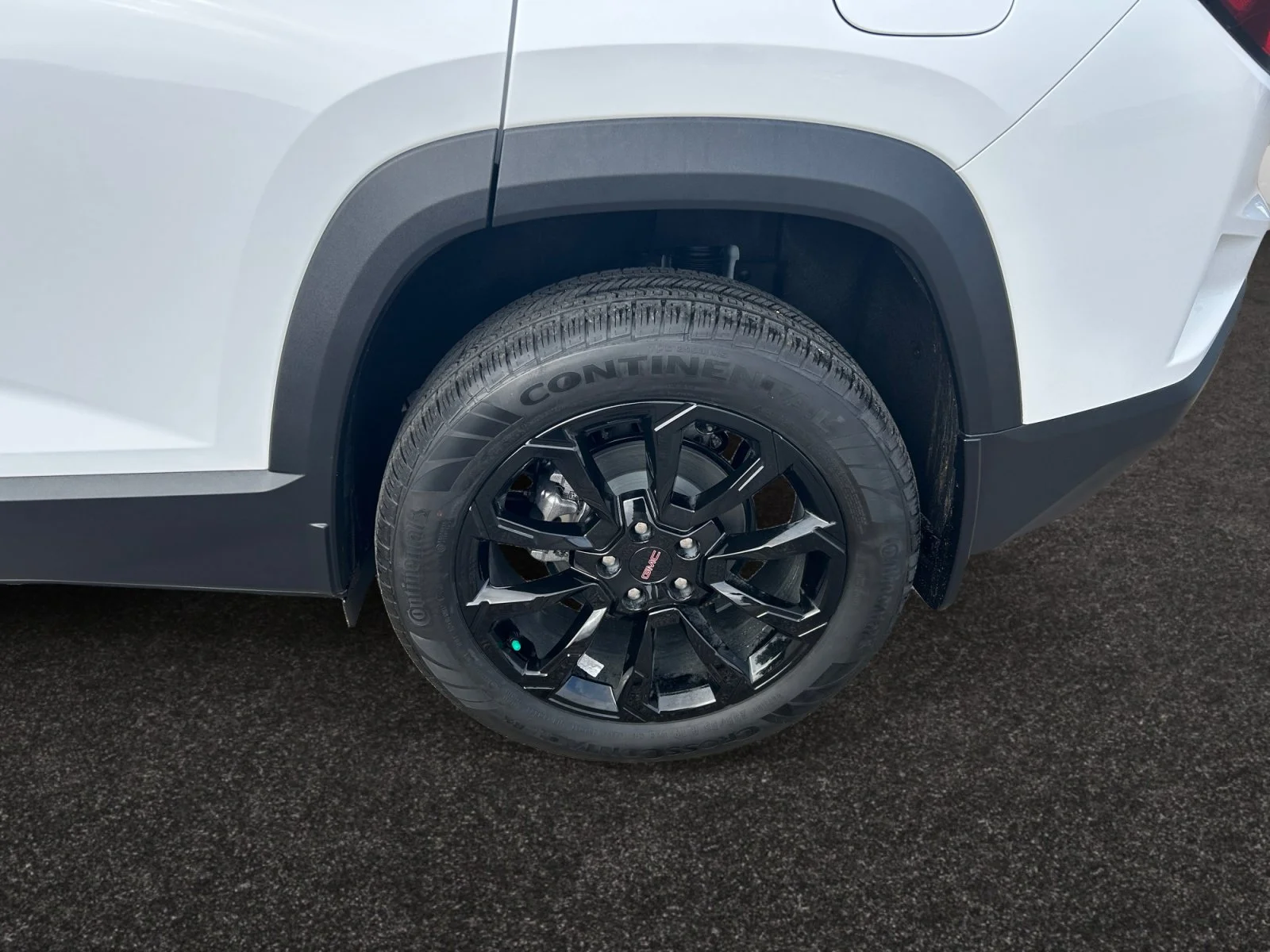 New 2027 Summit White GMC AWD Elevation image 9