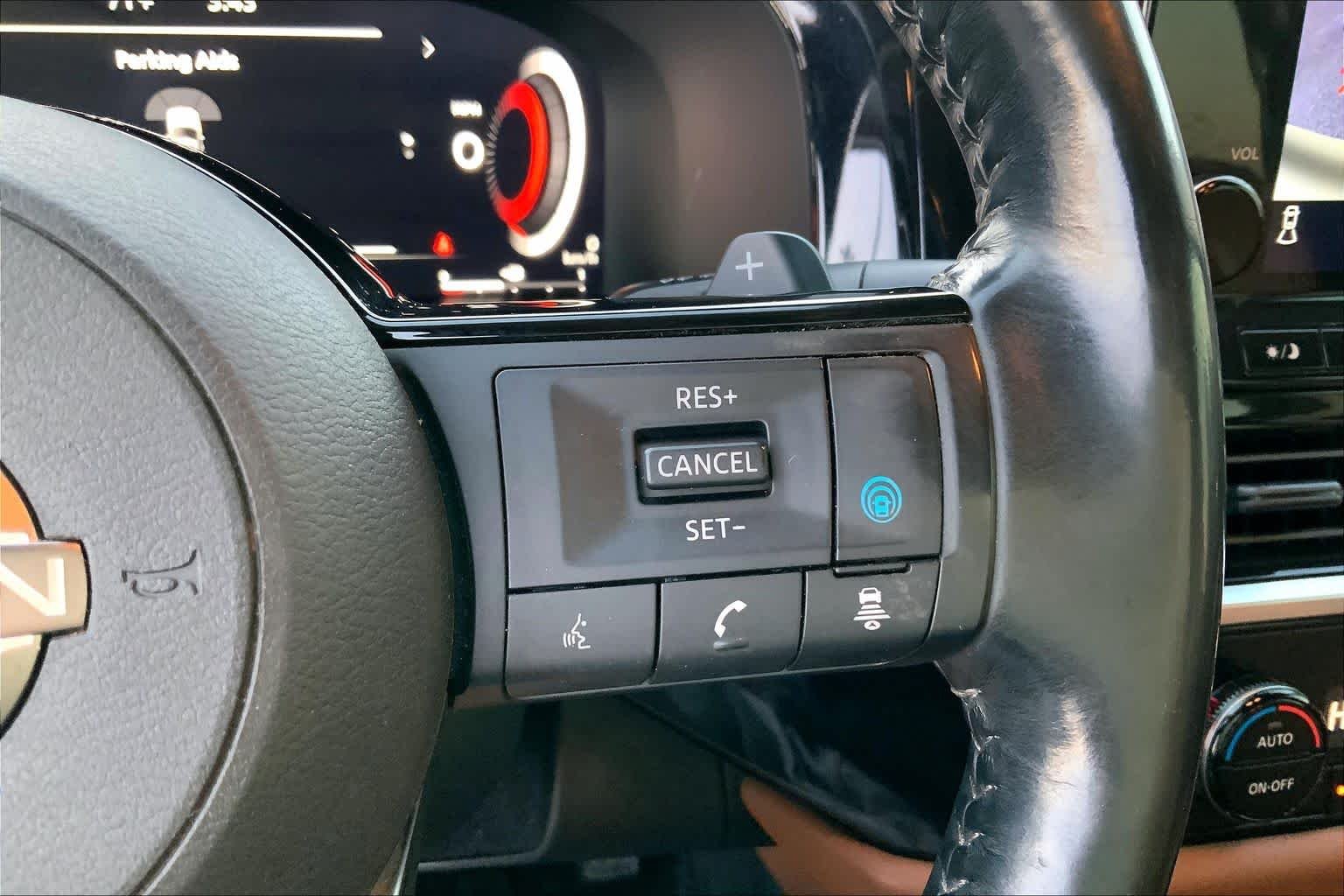 Used 2023 Super Black Nissan Platinum image 24