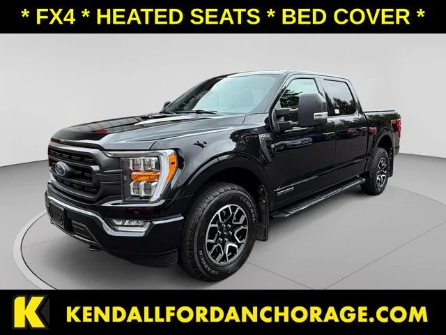 Used 2023 Agate Black Metallic Ford XLT image 1